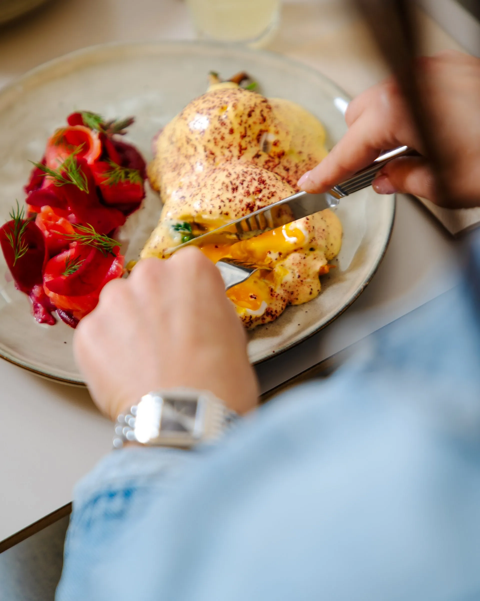 Eggs Benedict with house-made hollandaise, the dish Sophie Matthey names as the house signature (RTS, 2026).