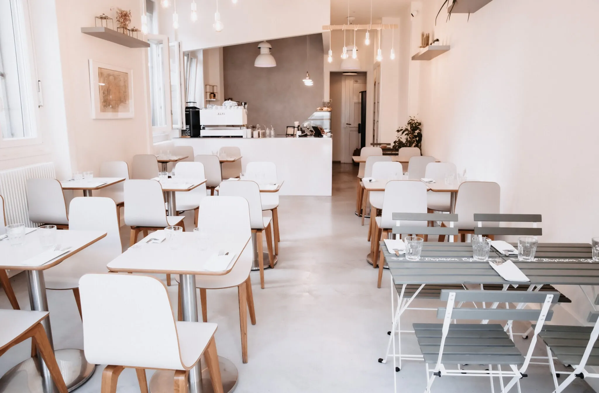 The dining room: Scandinavian furniture, counter, natural light.