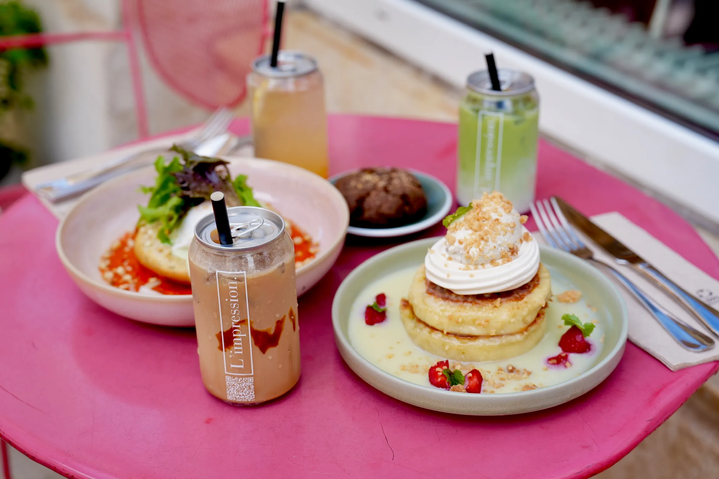 Large brunch table with a spread of dishes and drinks