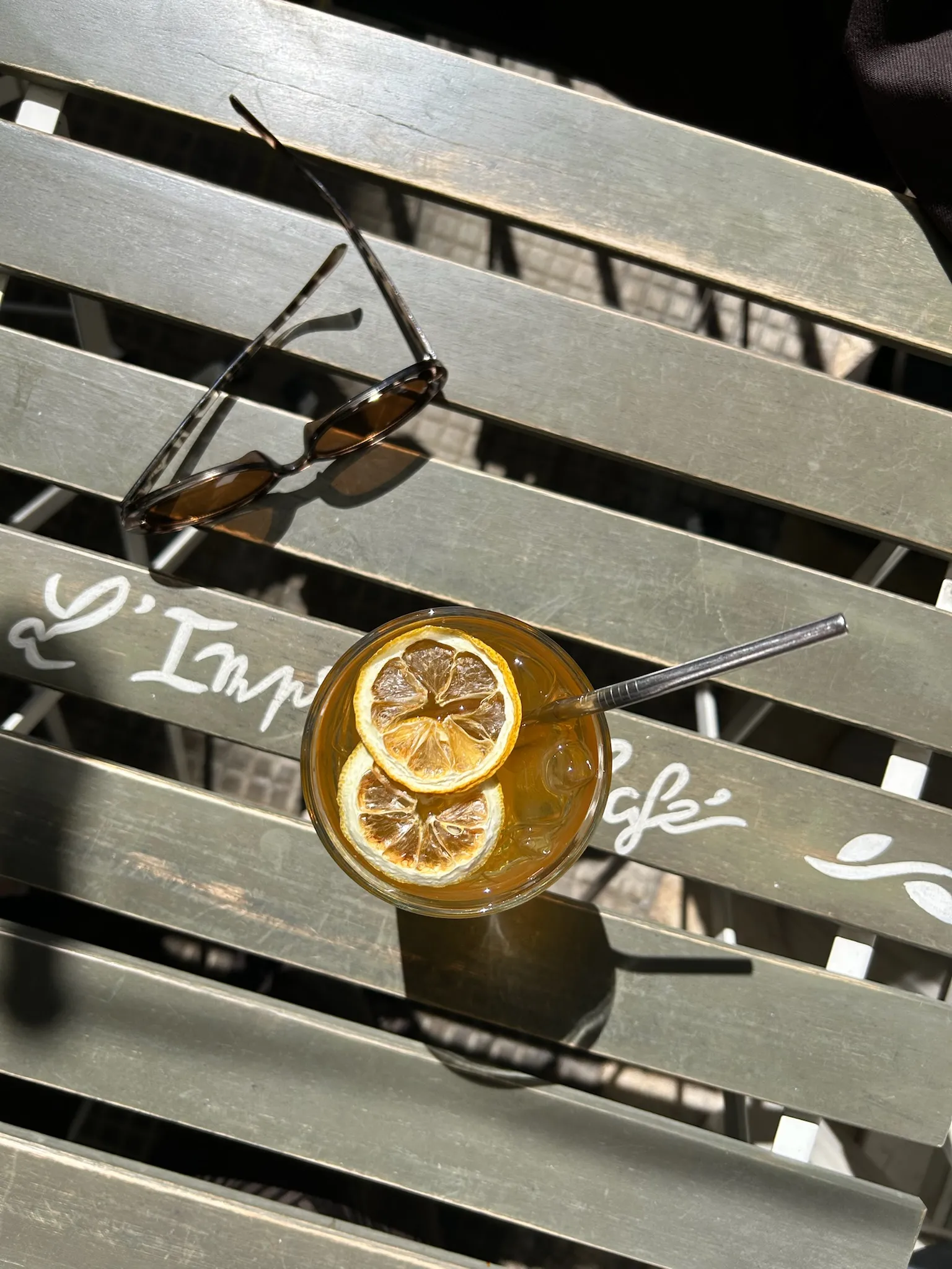 House iced tea with dried lemon, seen from above on the terrace